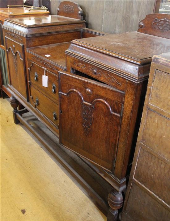 Oak sideboard, applied carved motifs, on bulbous block supports united by stretchers
